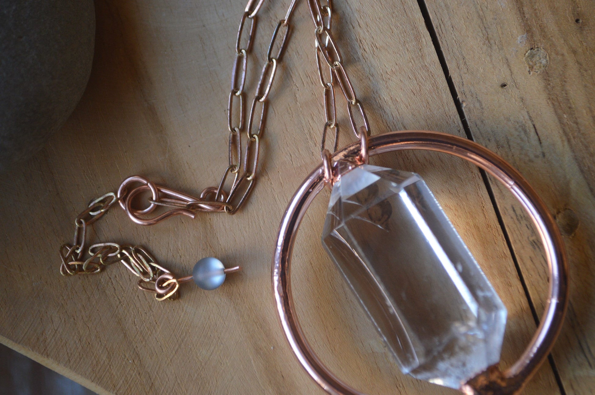 Statement copper pendant with polished double terminated quartz