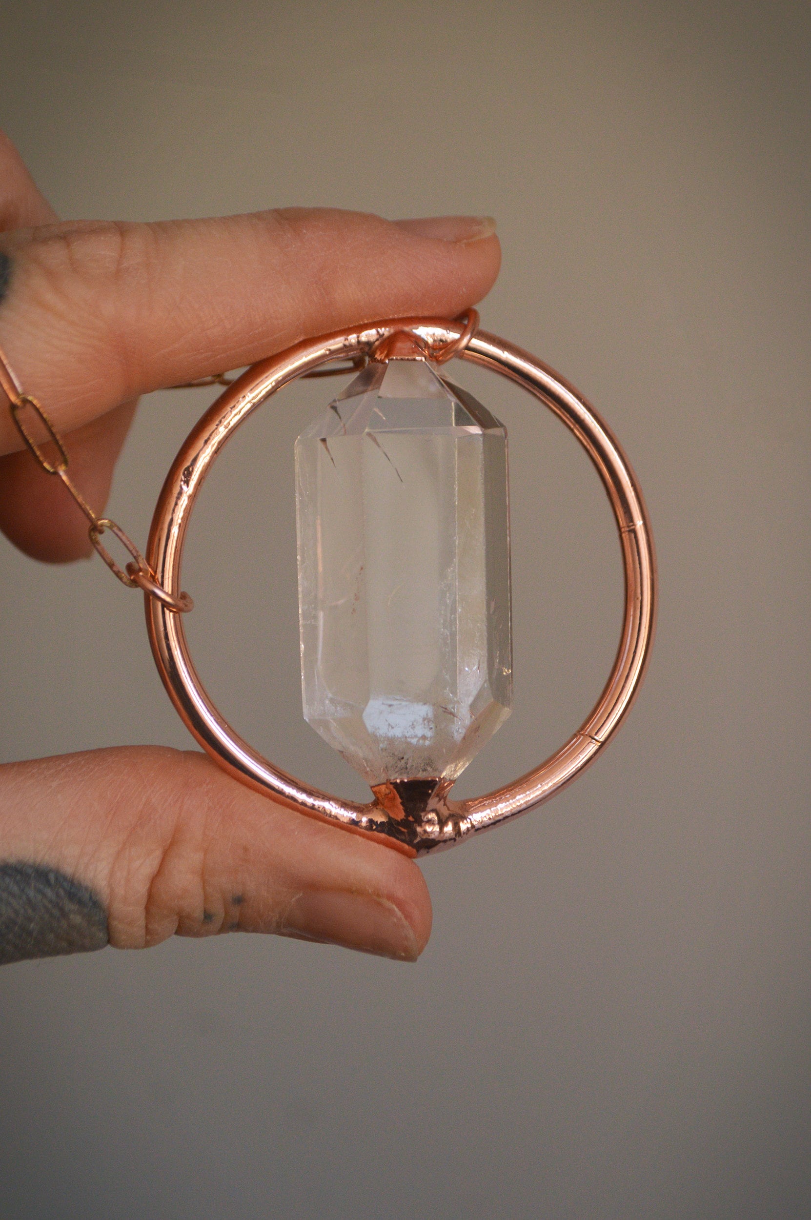 Statement copper pendant with polished double terminated quartz