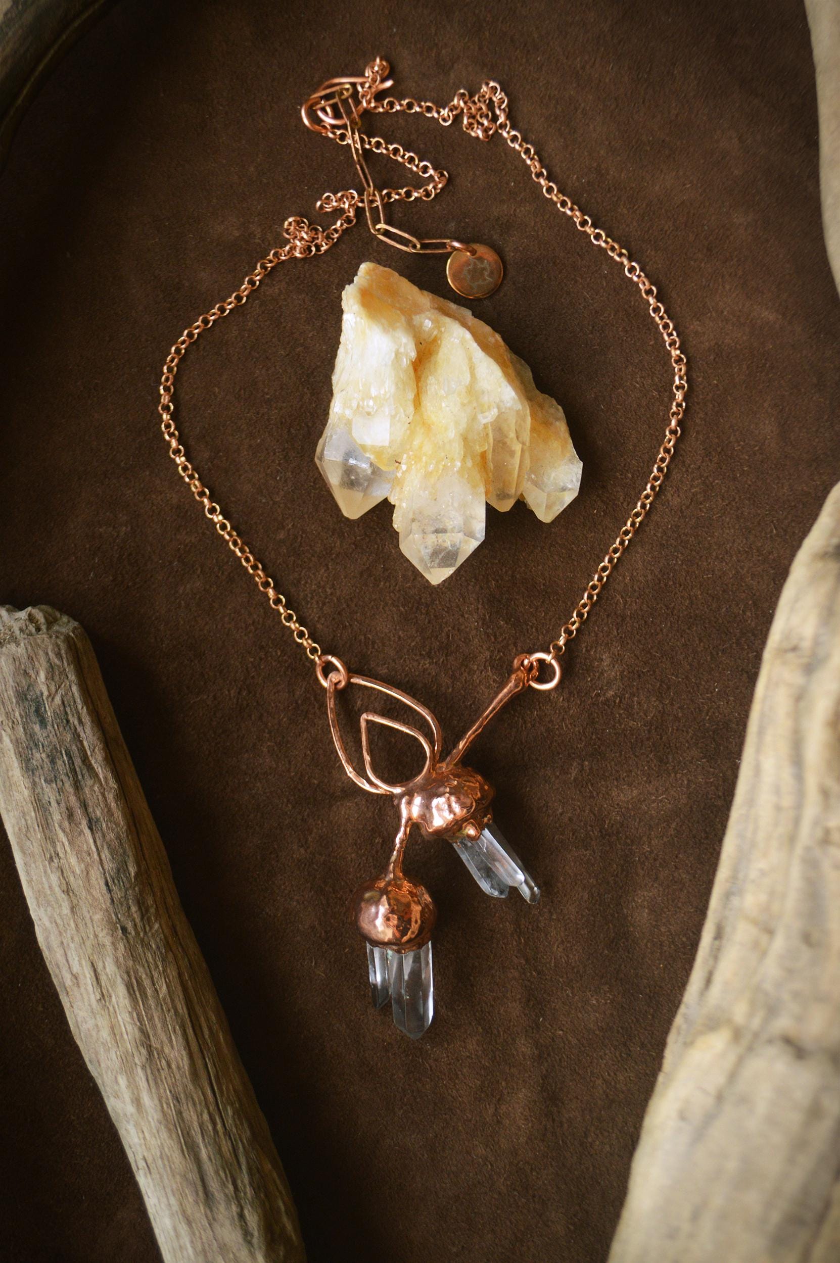 Unique piece. Real acorn formed in copper. Botanical pendant with raw quartz points