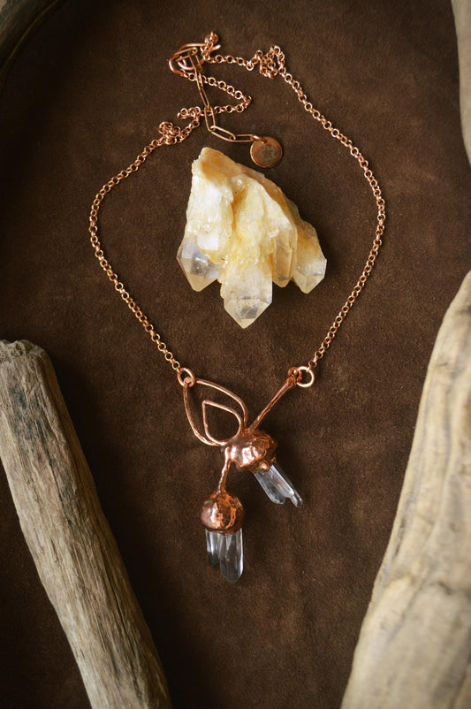 Unique piece. Real acorn formed in copper. Botanical pendant with raw quartz points