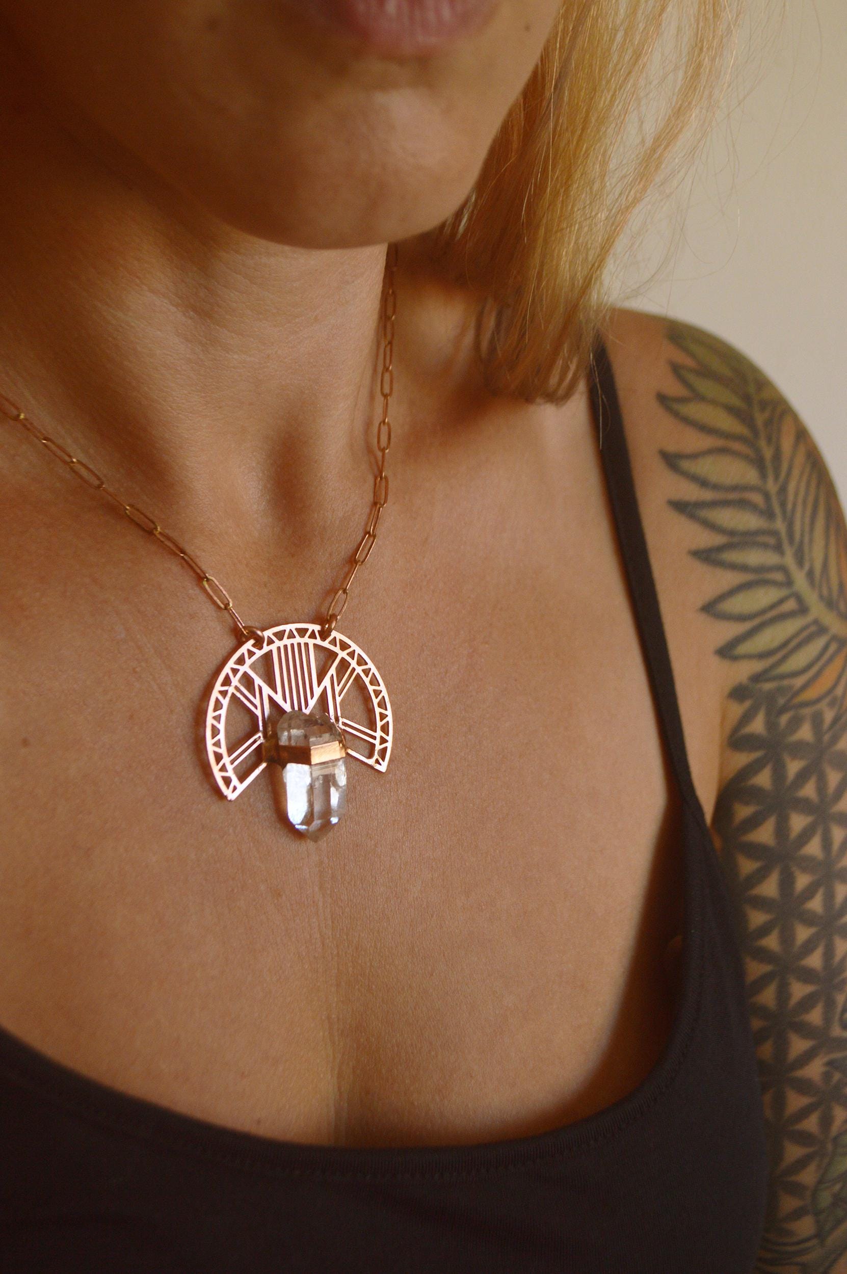 SOLSTICE collection - Geometric pendant with raw double terminated quartz