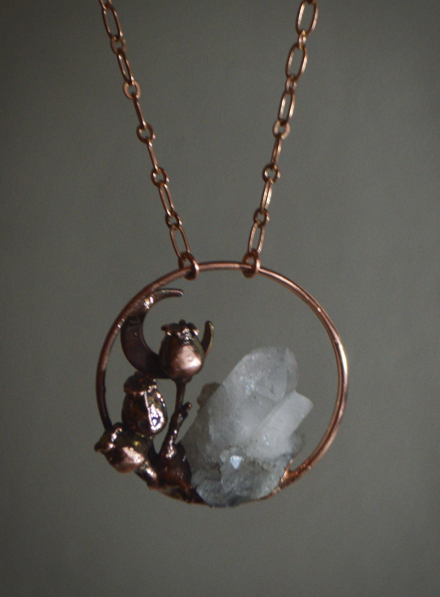 Real botanicals formed into copper, necklace with raw quartz shard and crescent moon