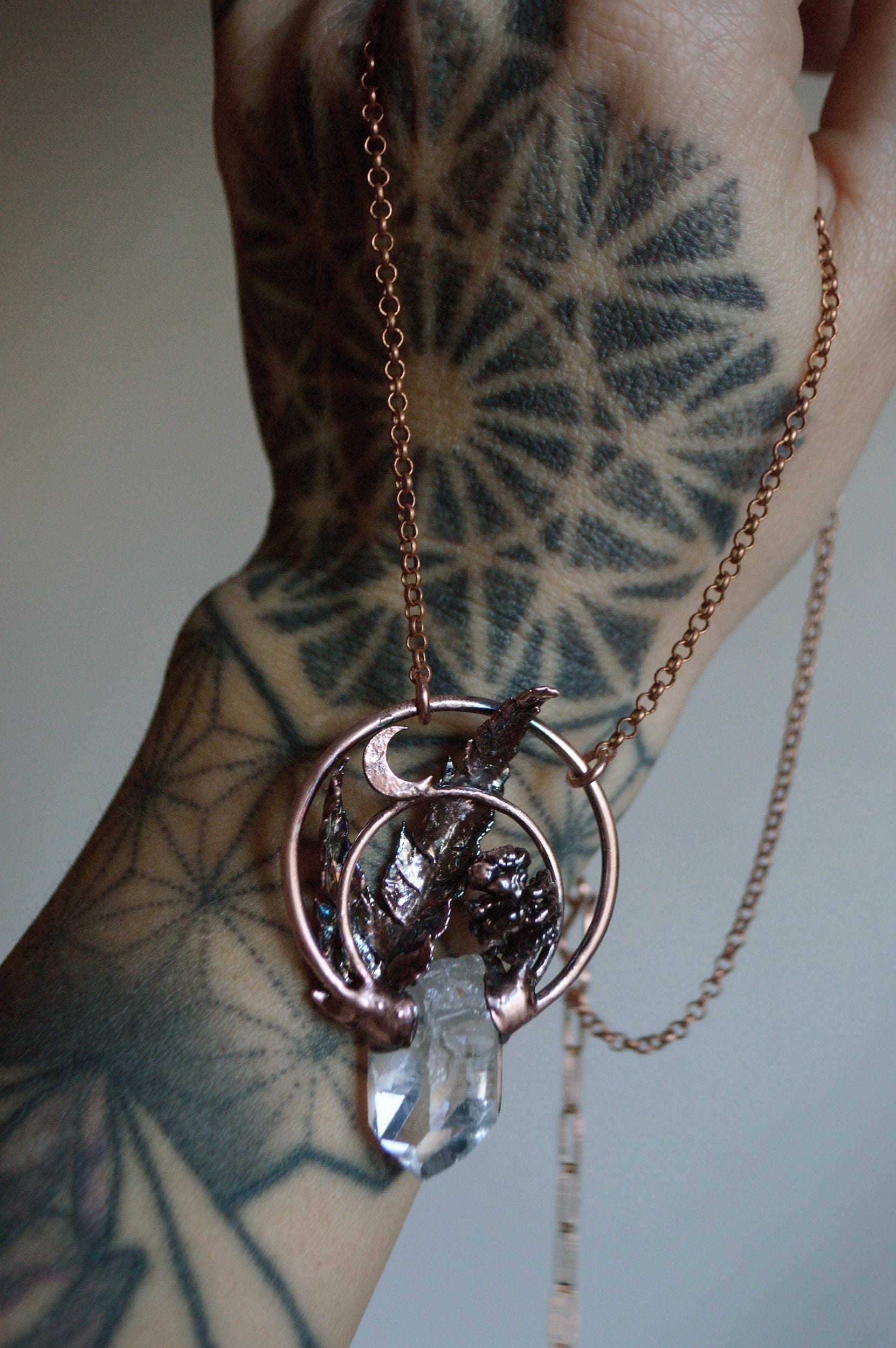 Real pinecone and fern necklace with raw quartz shard and crescent moon