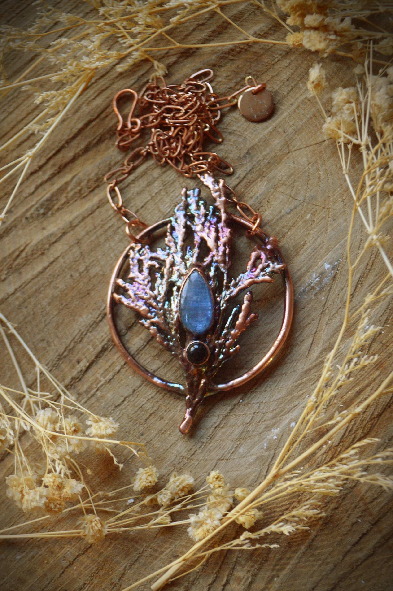 Reversible pendant, Kyanite and black onyx with real pine. Rainbow copper necklace