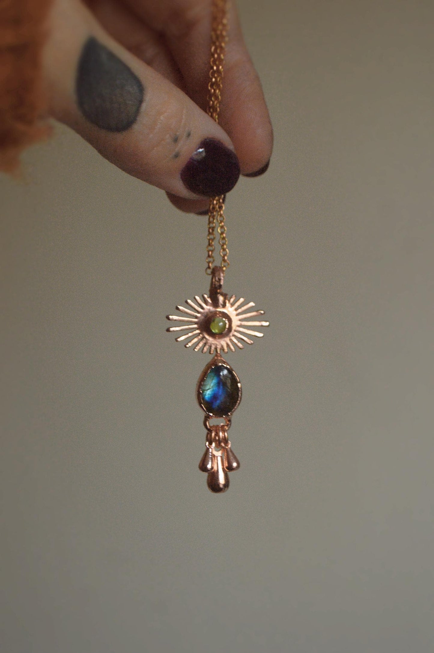 Crying eye pendant with labradorite and peridot. Fringe tassel jewellery