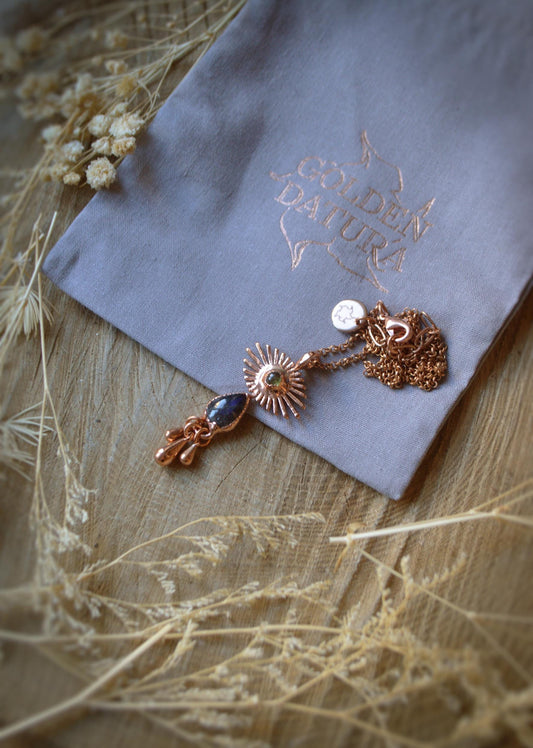 Crying eye pendant with labradorite and peridot. Fringe tassel jewellery