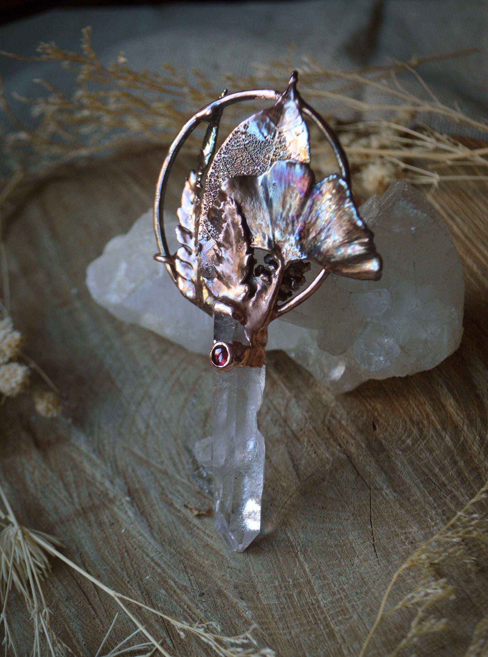 Real leaves bouquet formed in copper. Botanical pendant with raw quartz and garnet
