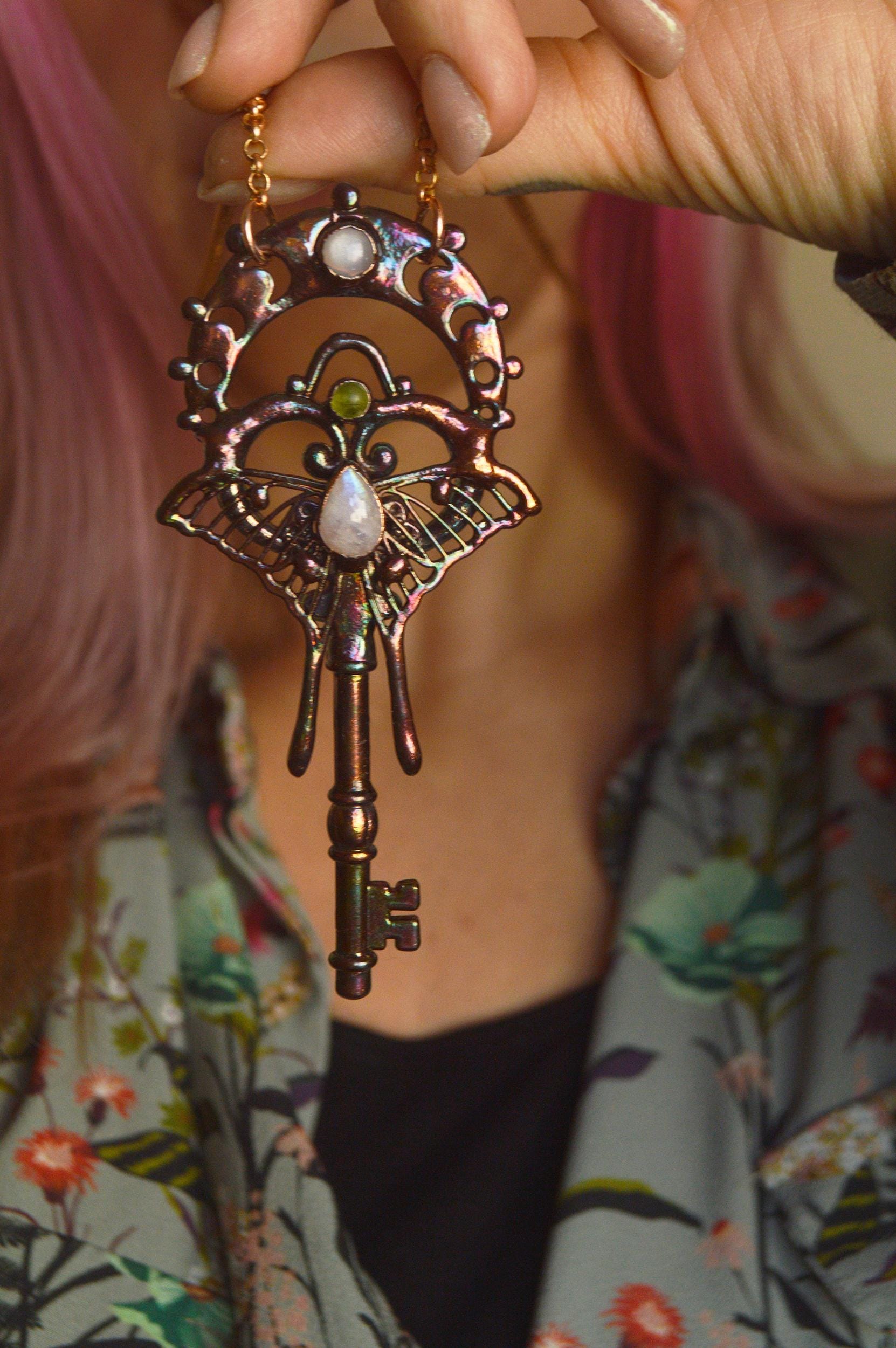Magical key pendant with moonstone and peridot, whimsical jewellery
