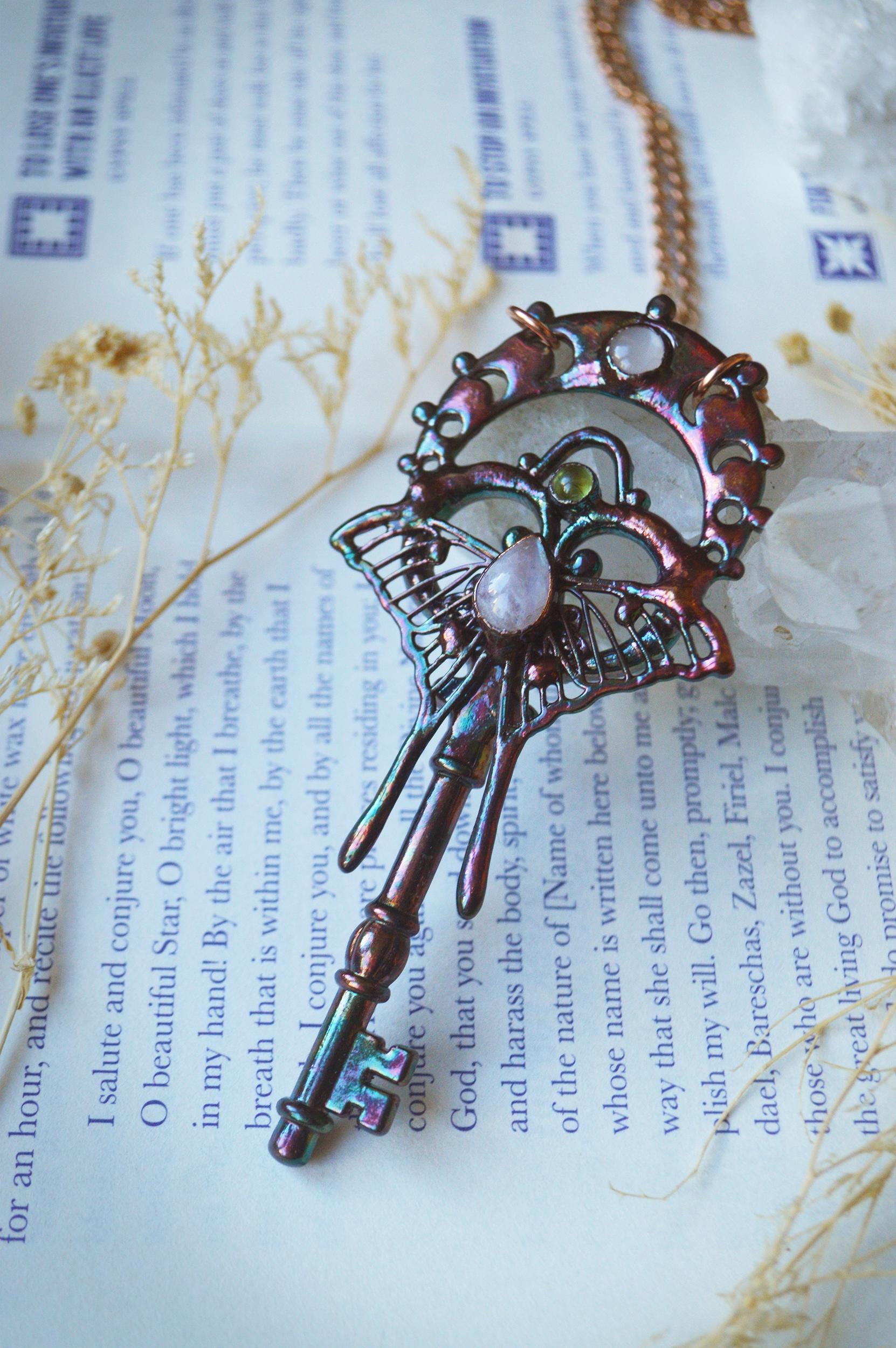Magical key pendant with moonstone and peridot, whimsical jewellery