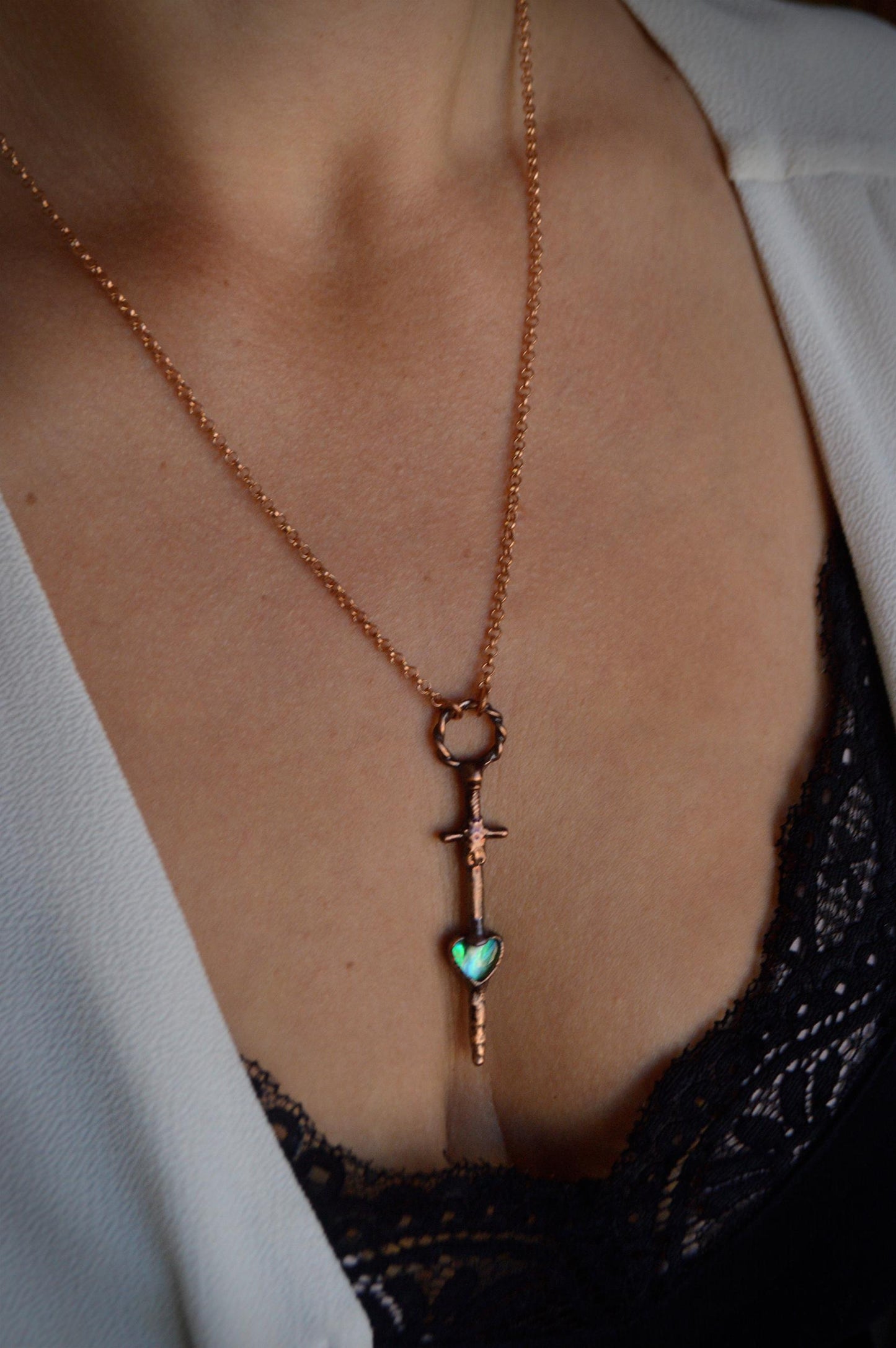 Heart and dagger necklace with abalone shell. Romantic goth pendant