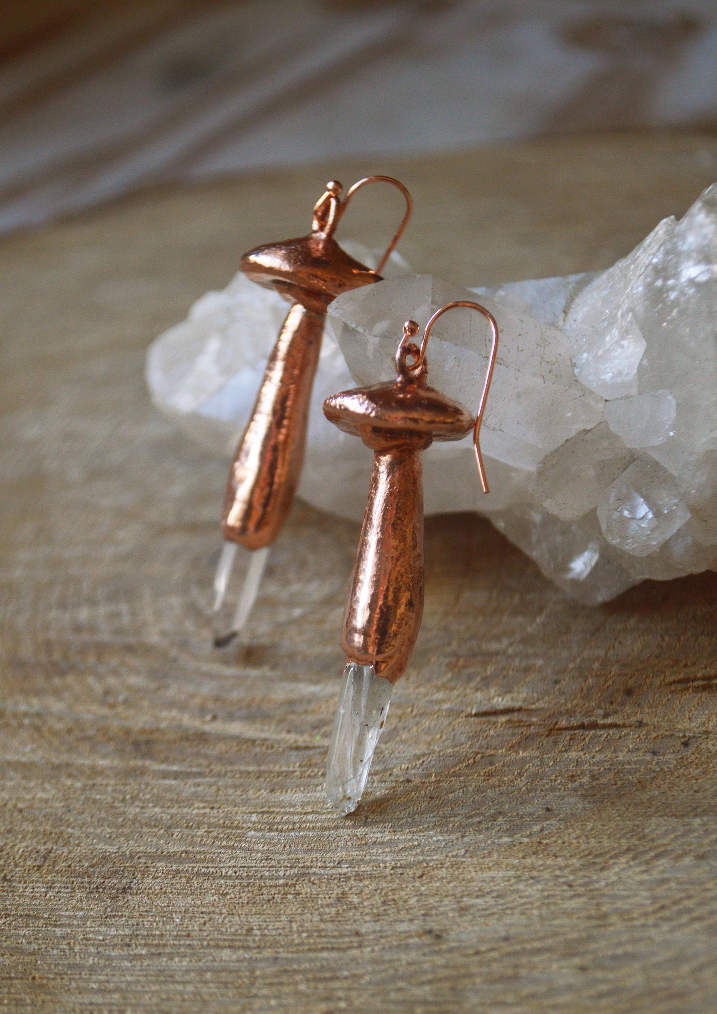 Whimsical mushroom earrings with quartz points. Electroformed cottage-core jewellery