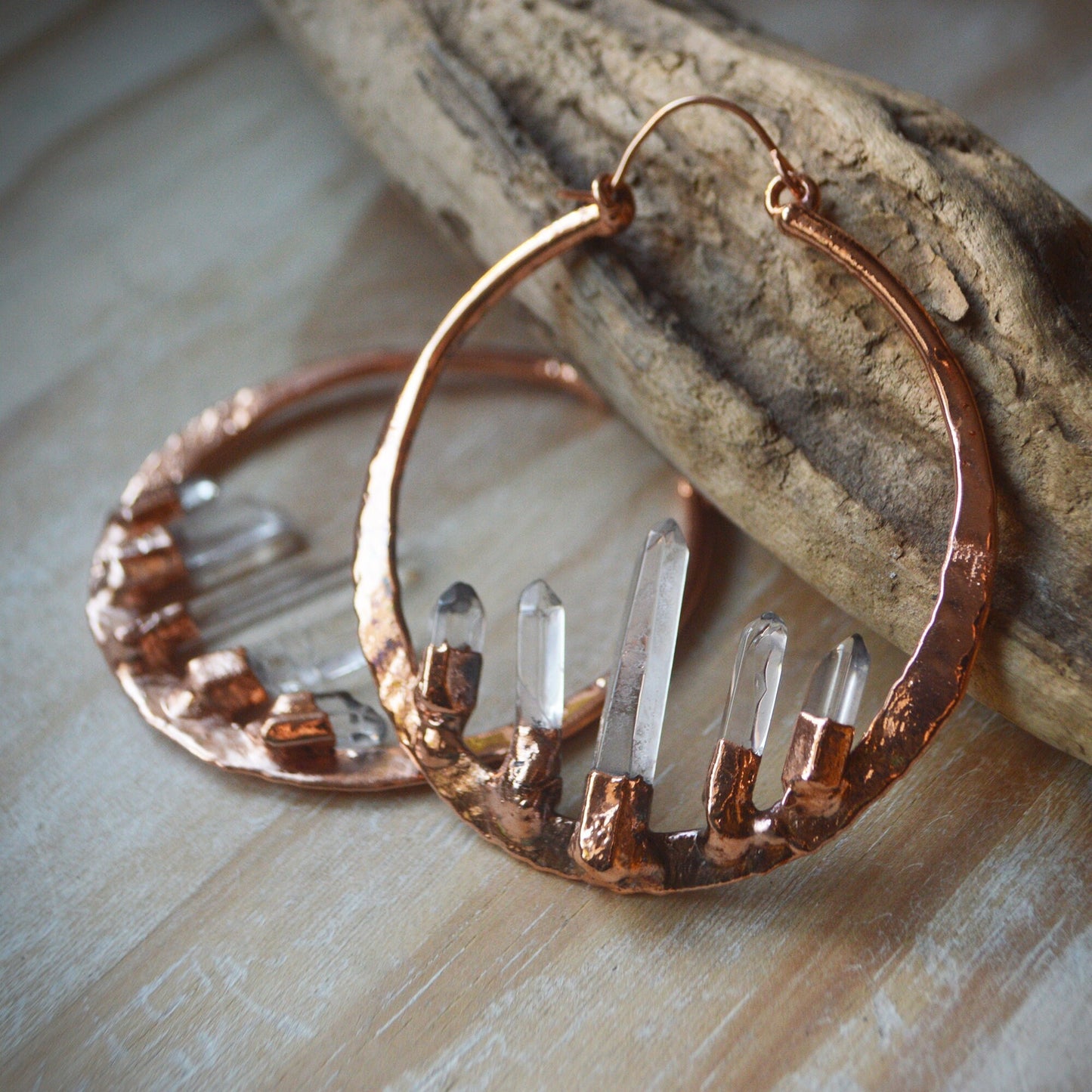 Oversized hammered hoops with quartz points. Electroformed rustic jewellery
