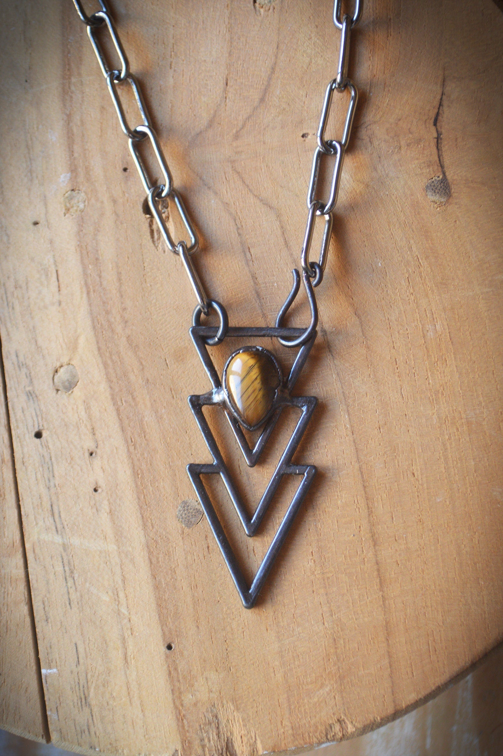 Black tiger eye men's geometric necklace. Hardware gunmetal chain with front clasp