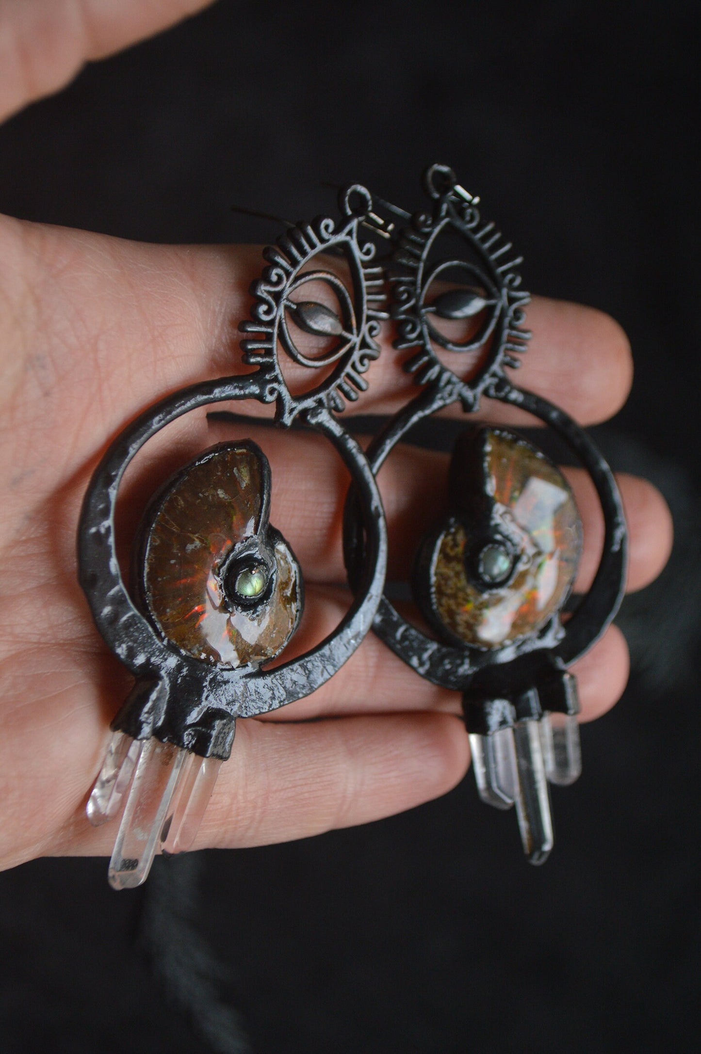 Statement earrings with iridiscent ammonite, labradorite and quartz points. Eye witchy design. Gunmetal black jewellery