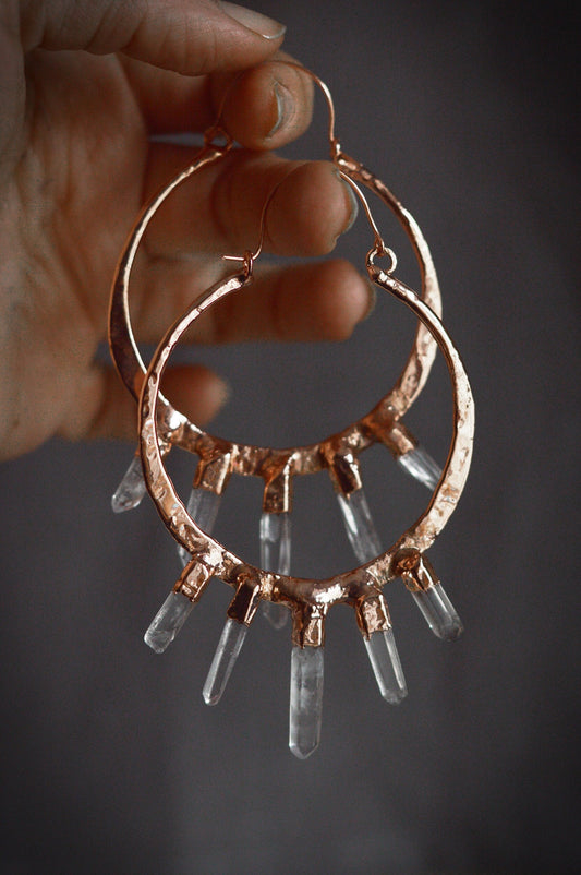 Oversized hammered hoops with outward quartz points. Electroformed rustic jewellery