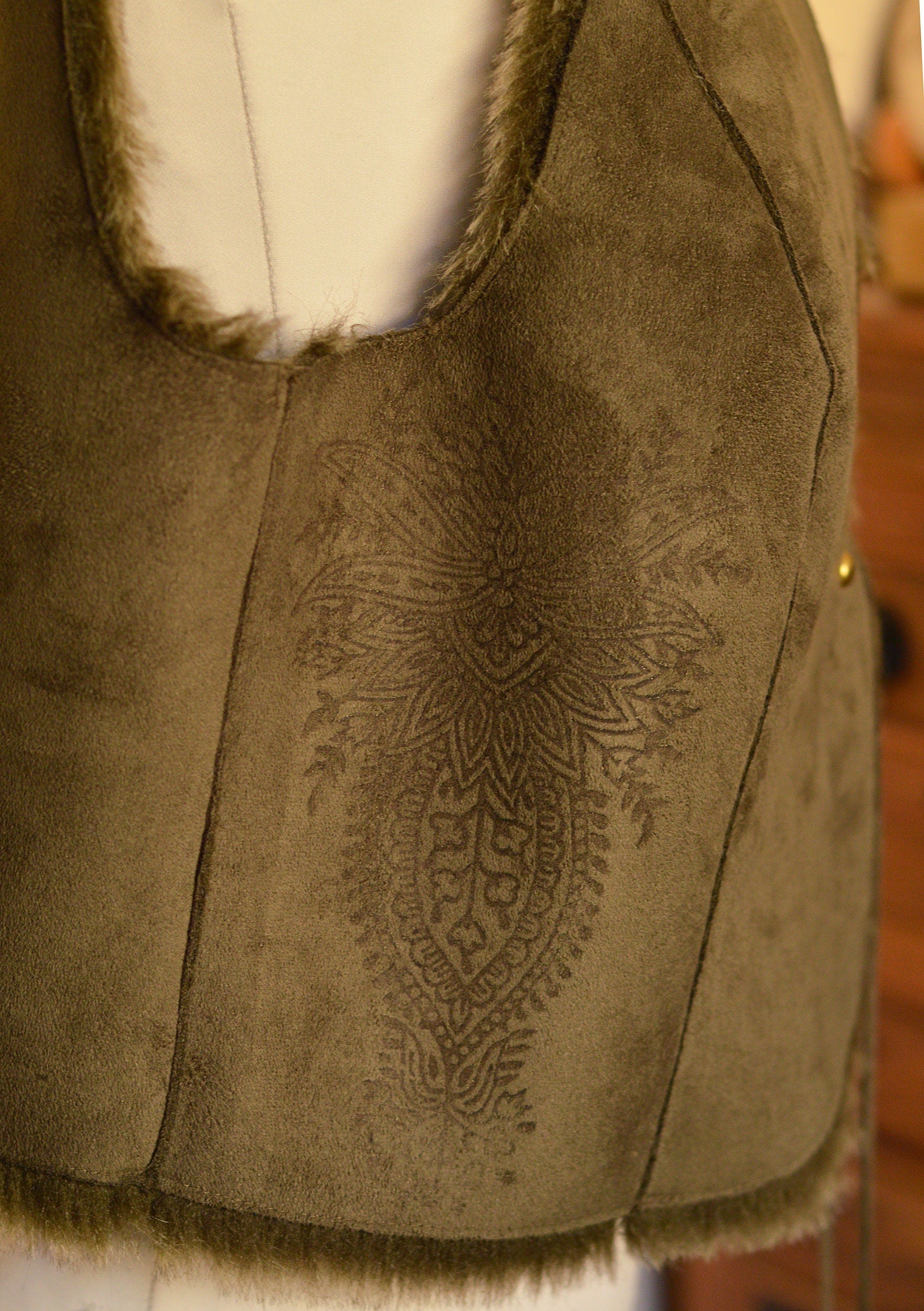 Army green cropped waistcoat. Seed of life applique,studs and hand printed
