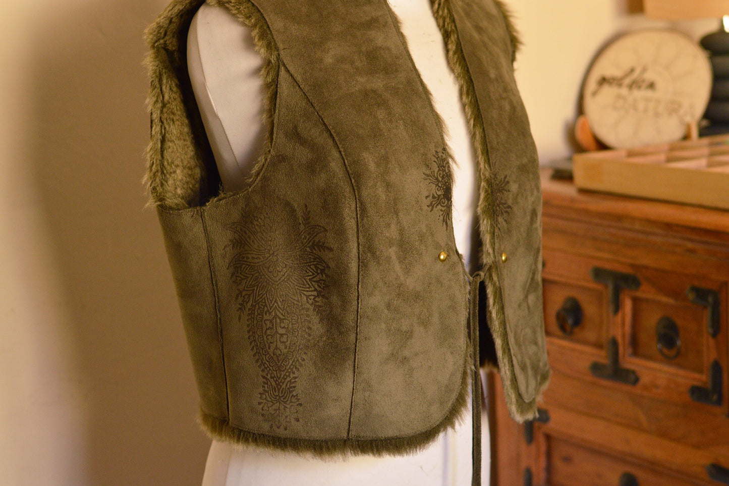 Army green cropped waistcoat. Seed of life applique,studs and hand printed