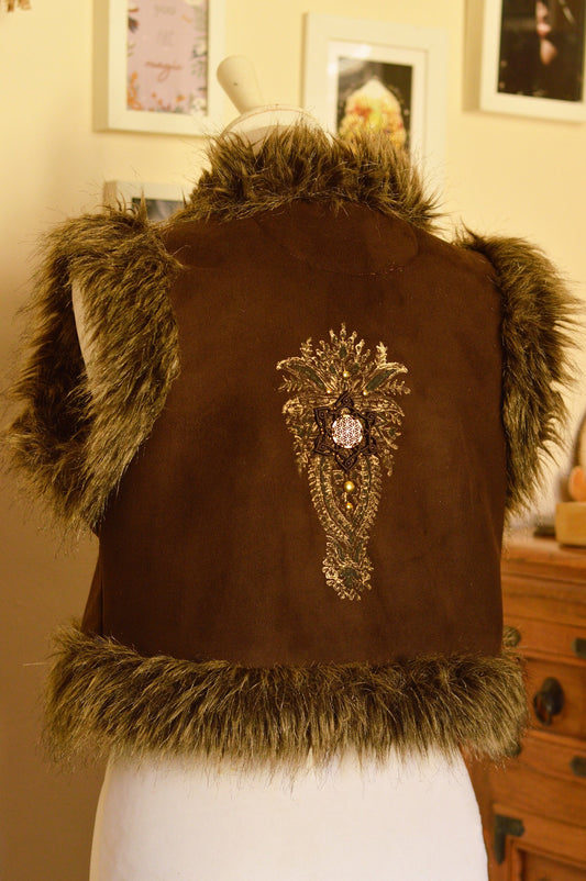 Dark brown cropped faux fur waistcoat, embellished with golden block print, golden studs and macrame sacred geometry applique. Bohemian, hippie, festival style
