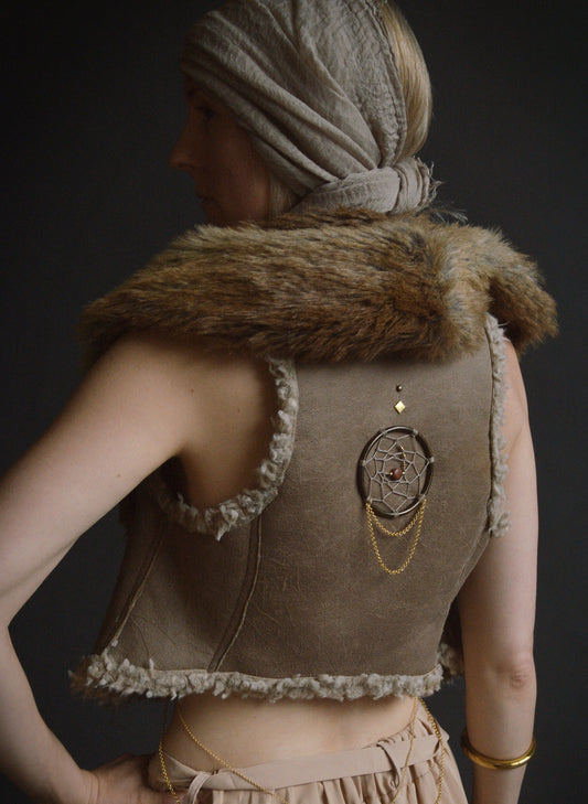 Taupe colour waistcoat with faux fur collar. Embellished with stud, chains and dreamcatcher